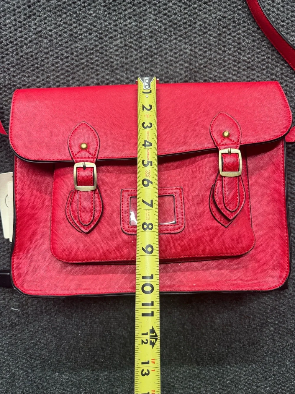 Classic Red Leather Satchel with Front Pocket and Adjustable Strap